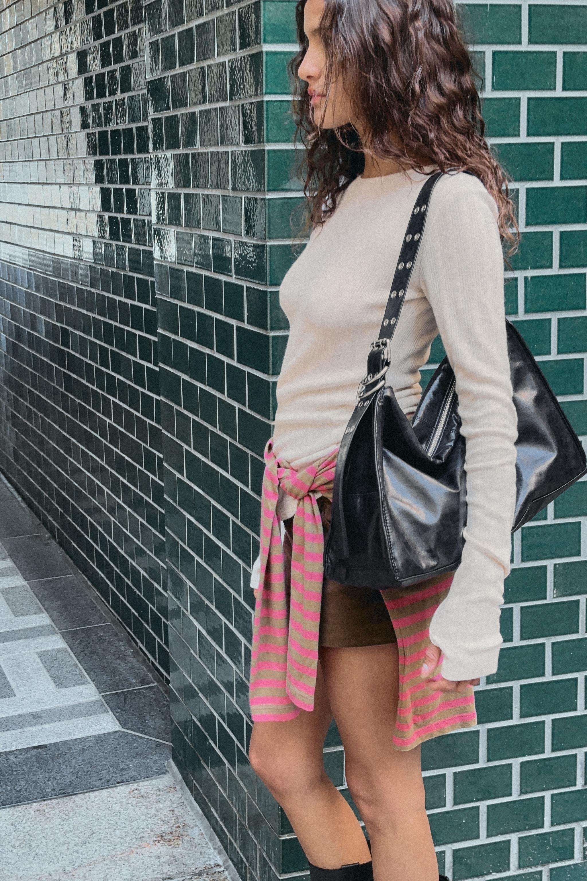 MAXI BUCKET BAG WITH METAL EYELETS